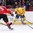 MONTREAL, CANADA - DECEMBER 28: Sweden's Rasmus Asplund #18 plays the puck while Switzerland's Jonas Siegenthaler #25 defends during preliminary round action at the 2017 IIHF World Junior Championship. (Photo by Andre Ringuette/HHOF-IIHF Images)

